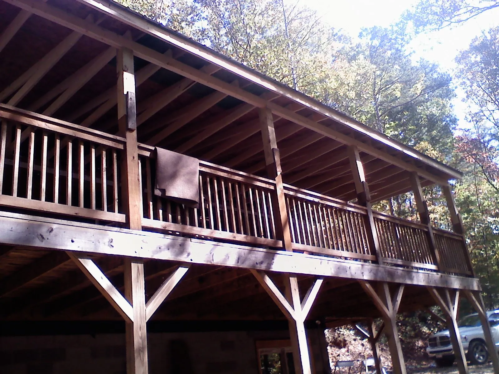 Timber framing under a new elevated porch and deck — Roof Leak Repair in Paden City by Roofing Brothers